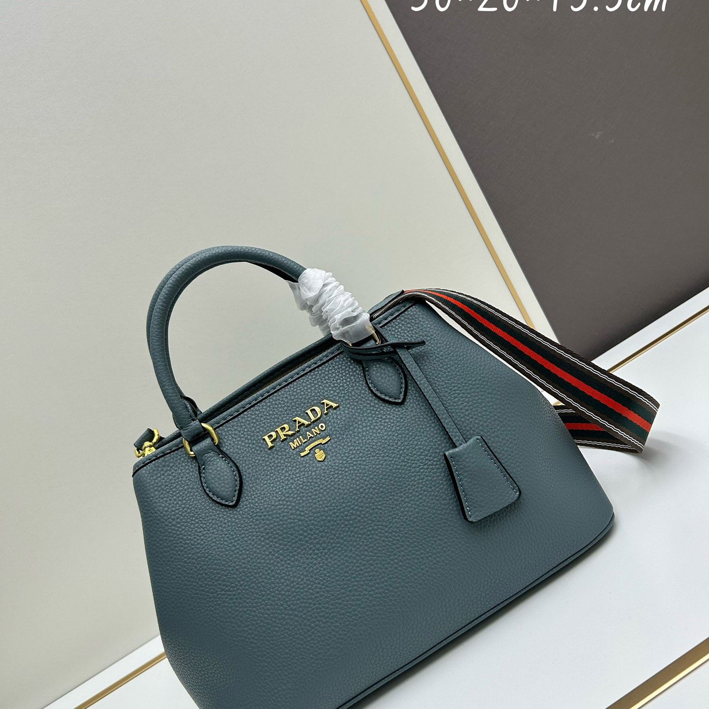 Pra*a top handle bags